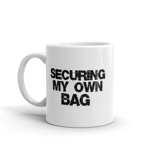 SECURING MY OWN BAG MUG