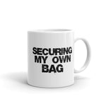 SECURING MY OWN BAG MUG